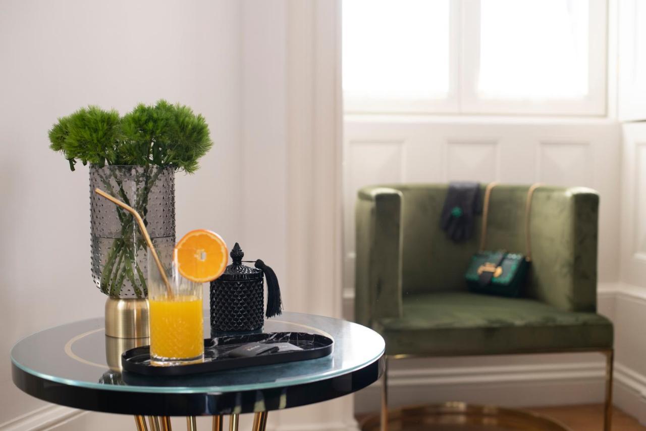1877 Estrela Palace Aveiro Bagian luar foto A glass of orange juice